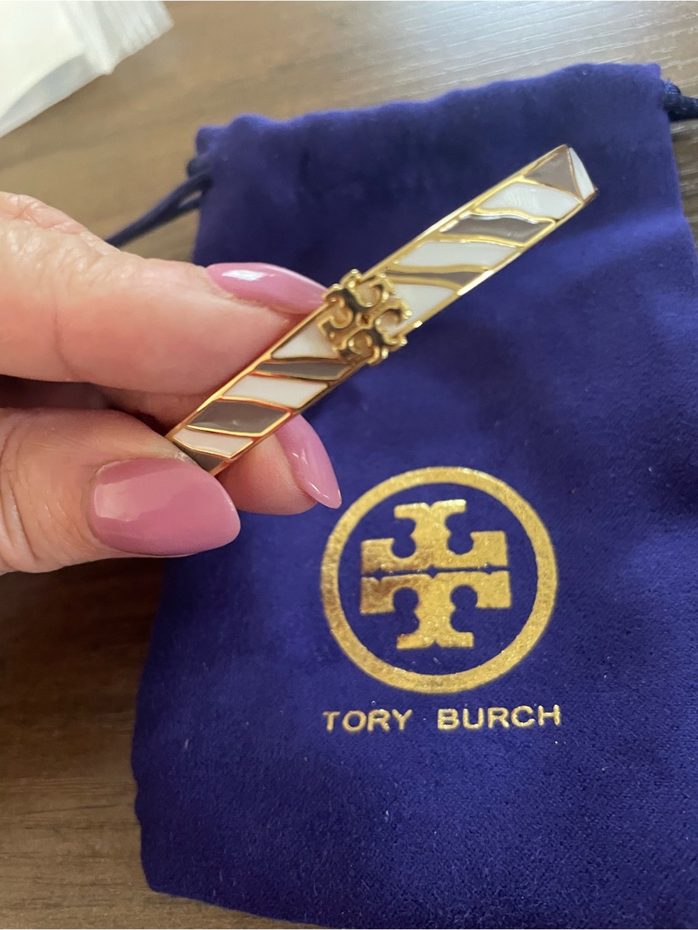 Tory Burch Gold tone White & light brown Diagonal Stripe Logo bangle bracelet